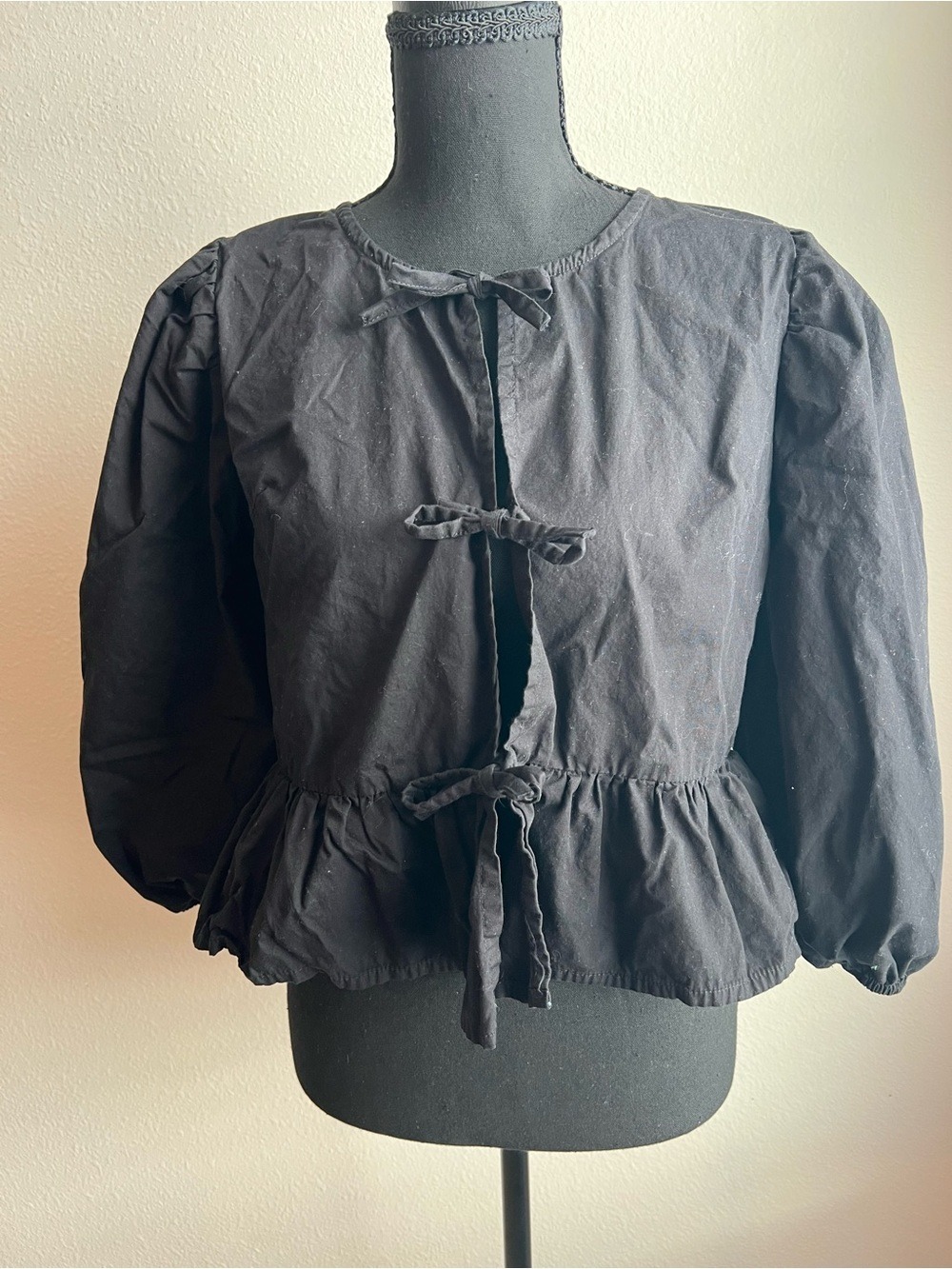 Sim & Sam Black Peplum Tie-Front Bagatelle Top